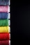 Sewing Quilting Thread, Rainbow colors. on black background with place for your own text