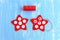 Sewing red Christmas star diy. How to sew on a white felt balls to a red felt stars. Decorative stitch. Christmas diy