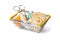 sewing supplies in a metal shopping basket on a white insulated background