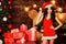 Sexiness comes naturally. sexy woman in santa hat. sensual girl in erotic lingerie. girl with red present box. happy new
