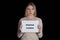 Sexual discrimination problem, voting right, sexism. Young woman holding banner with inscription is woman power