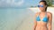 Sexy Beach bikini Asian woman posing wearing sunglasses