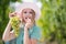 Sexy grape. A pretty sexy young woman holding a bunch of grape on her face. Young woman licking grapes of green grapes