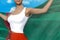 Sexy lady in bright skirt holds Turkmenistan flag in hands behind her back on the cloudy sky background - flag concept 3d