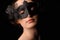 Sexy model woman in venetian masquerade carnival mask. Christmas and New Year celebration. Glamour lady