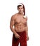 Sexy shirtless Santa Claus on background