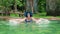 Sexy sllim girl in a blue swimsuit, hat and sunglasses swimming in the thermal pool on a sunny day. Slow motion Young