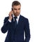 sexy unshaved businessman talking on the phone