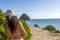 Sexy woman with hat on dolphin beach in the hotel zone of Cancun Mexico. It is a tropical paradisiacal beach of white and golden