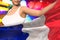 sexy woman holds France flag in front on the party lights - flag concept 3d illustration