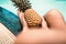 Sexy Woman is Relaxing in Swimming Pool While Holding Pineapple, Close-Up of Beautiful Woman Hold Pineapple and Relax Sunbathe in