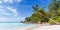 Seychelles Anse Georgette beach on Praslin island palm panorama panoramic view vacation sea