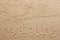 Seychelles handwritten from sand