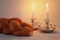 shabbat image. challah bread, shabbat wine and candles