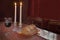 Shabbat Observance At Sunset: Challah, Glass of Wine, Two Lit Candles