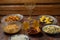 Shabbat table for family dinner with traditional holiday dishes on the table, rosary and menorah