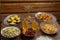 Shabbat table for a family meal with traditional holiday dishes on the table with a rosary