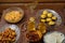 Shabbat table for a family meal with traditional holiday dishes on the table with a rosary