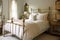 shabby chic bedroom with brass bed, wooden nightstands and white shams