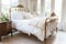 shabby chic bedroom with brass bed, wooden nightstands and white shams