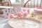 Shabby Chic pink baby shower decorations on table