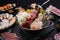 Shabu Shabu or Sukiyaki, a popular dish of pork, beef, shrimp, squid, seafood and fresh vegetables. Placed on a table with a