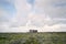 Shack in rugged landscape