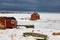 Shacks at frozen shore of Joe Batts Arm NL Canada