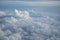 Shades of light blue color sky and constantly change floating white cloud heaven view from airplane window