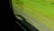 The shadow of a car moving quickly on the road, flashing road fence and grass, blurred traffic, HD video