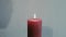 The shadow conceives a red bright warm candle and extinguishes the light before going to bed