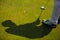 Shadow of golfer That is going to putt