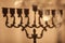Shadow of Hanukkah menorah, or hanukkiah. Jewish holiday Hanukkah background.