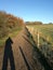 Shadow on hillside path