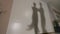 Shadow of man and woman dancing and rehearsing Latin American dance in costumes