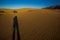 Shadow of photographer on the dunes in Death Valley National Park