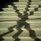 Shadow of a window grille on the stairs