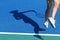 Shadow of woman tennis player