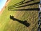 Shadow wooden swings with a guy with a beautiful panorama of the sea. Denmark