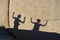 Shadows of dancing children on a rock in Jushua Tree Nationalpark