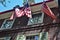 Shadows on three flags under a window on Old City Philadelphia