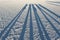 Shadows in the world`s largest salt flat, Salar de Uyuni in Bolivia, photographed at sunrise