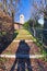 shadows of a young couple in love on the path that leads to the church