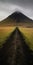 Shadowy Stillness: Orderly Symmetry Of A Dirt Road Next To An Icelandic Mountain