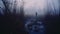 Shadowy Stillness: A Romantic Depiction Of A Man Walking In Fog