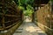 Shady alley between fenced Chinese traditional dwelling building