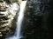 The shady Leuenfall waterfall