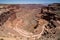 Shafer Canyon Road, a famous dirt road for 4x4 vehicles, overhead view in Canyonlands National Park, Islands in the Sky area