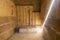 Shaft of light illuminating the interior of a temple with hieroglyphs at the Saqqara Necropolis