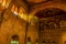 Shafts of light piece the gloom in a vaulted hall in a fort in Rajasthan, India